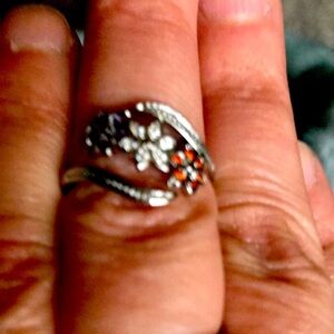 Elegant Silver and Orange Floral Ring